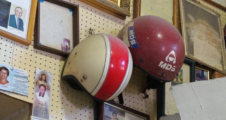 Wall mounted old helmets